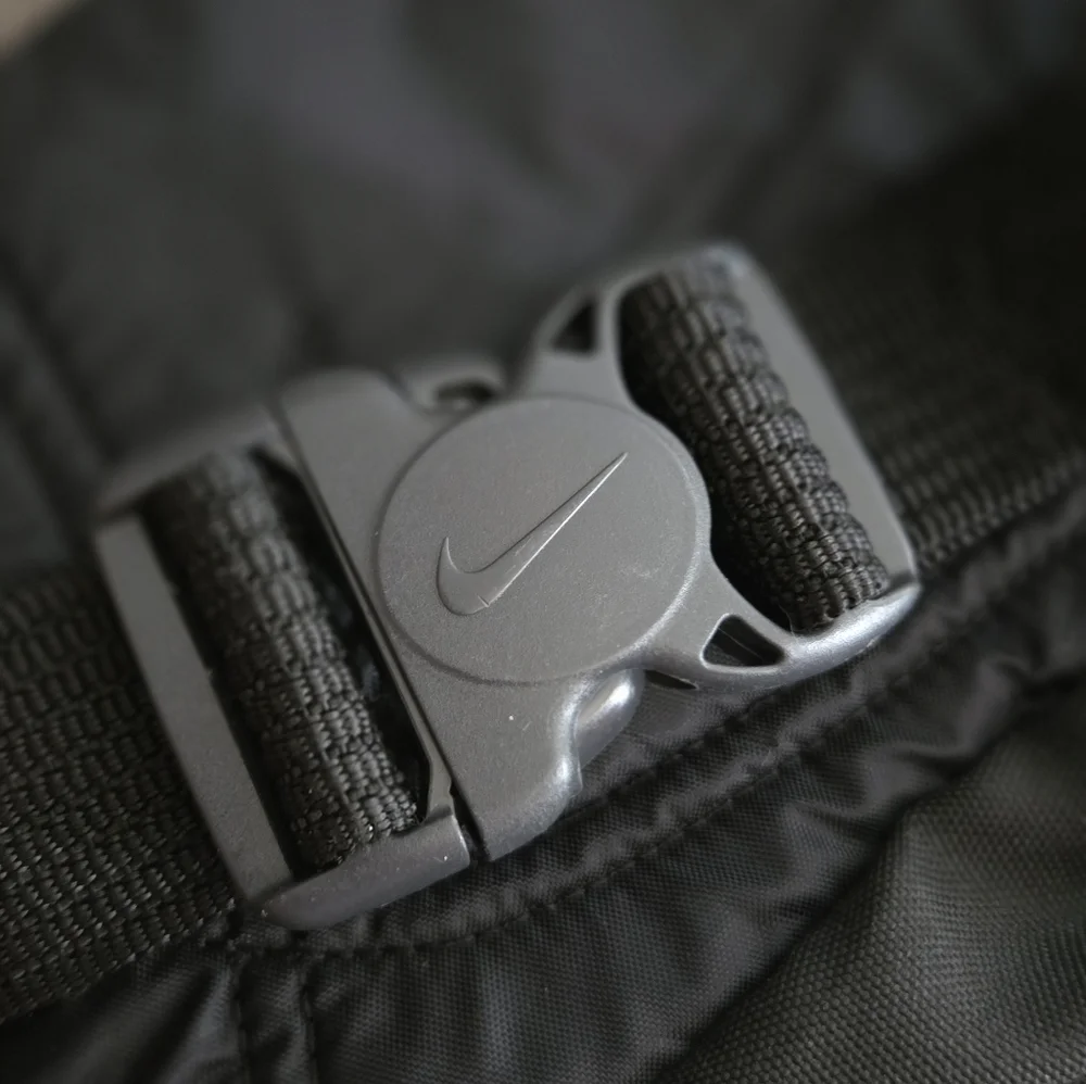 Nike Black Waist Bag with White Swoosh and Reflective Trim